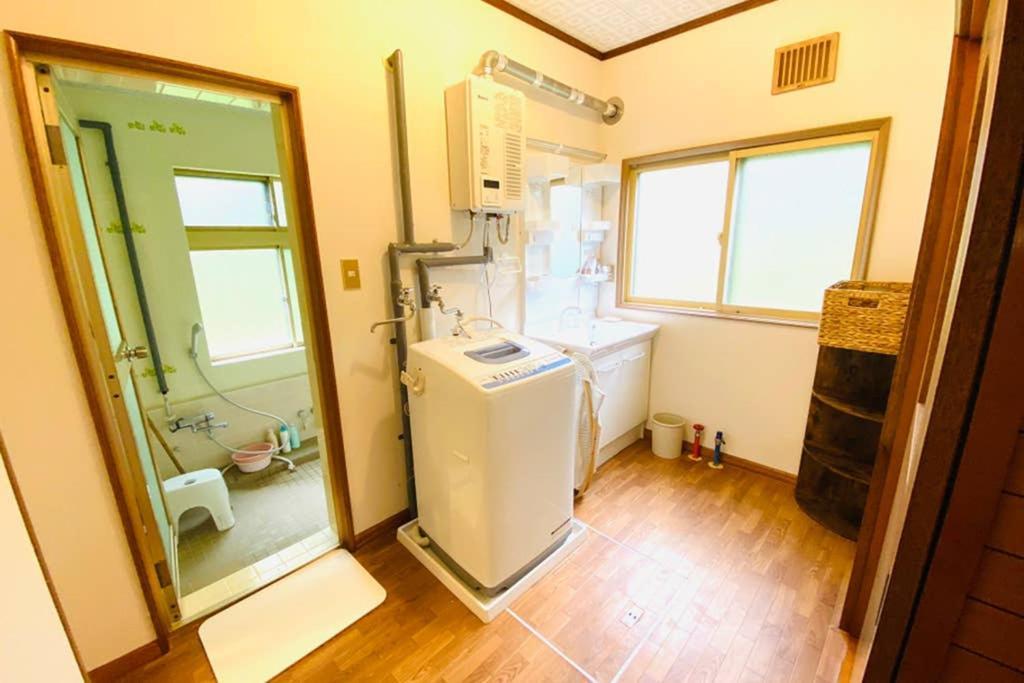 Manyi's Onsen House 天然温泉マンイの湯 別荘 白老町