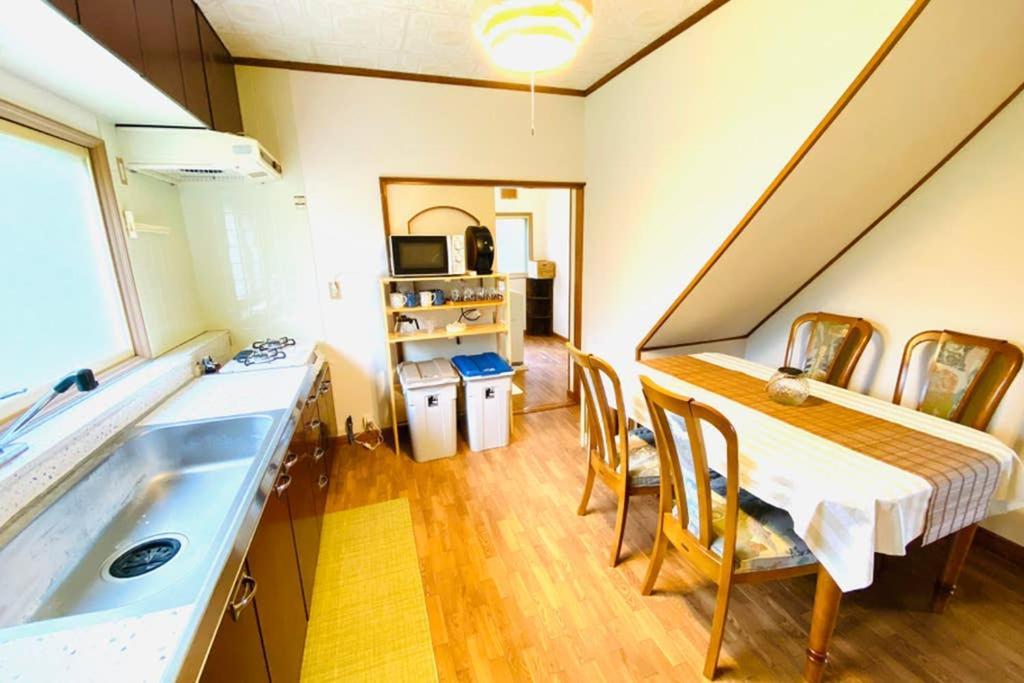 Manyi's Onsen House 天然温泉マンイの湯 *